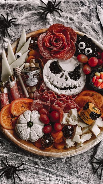 Halloween Food Ideas Charcuterie, Jack Skellington Snacks, Halloween Prosciutto Skull, Ghost Face Brie, Ghostface Brie, Scream Face Brie, Pumpkin Shape Charcuterie Board, Witch Charcuterie Board Ideas, Charcuterie Halloween Board Ideas