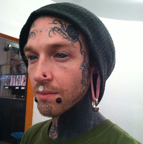 Matthew Blake showing off his new tattooed scleras and other modified bits. Stretched labrets, stretched philtrum, stretched nostrils, ear weights in his stretched lobes, a surface anchor, and some facial tattoos. // instagram@matthewblake // Sclera Tattoo, Dermal Implants, Rhino Piercing, Eyeball Tattoo, Philtrum Piercing, Tattoos Instagram, Men's Piercings, Modern Primitive, Tattoo Face