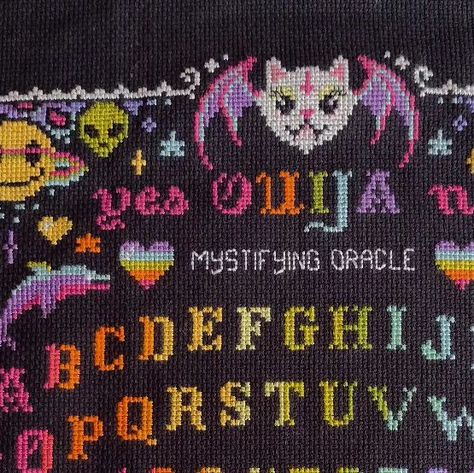 Julie Dayberry on Instagram: "Loved every single stitch! @thewitchystitcher is a genius! #thewitchystitcher #lisafrank #pastelgoth #lemonylisafrank" Goth Cross Stitch, Gothic Cross Stitch, Lisa Frank Cross Stitch, Lisa Frank Cross Stitch Patterns, Cross Stitch Lisa Frank, Pastel Goth Cross Stitch, Planchette Cross Stitch, Ouija Cross Stitch Pattern, Buffy Cross Stitch