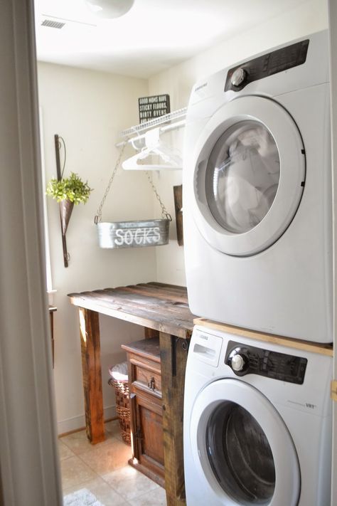 I love the socks bucket. Laundry room ideas Laundry Room Tables, Laundry Room Folding Table, Stacked Laundry Room, Laundry Room Storage Shelves, Laundry Room/mud Room, Earth Style, Small Laundry Room Organization, Stackable Washer And Dryer, Farmhouse Laundry Room