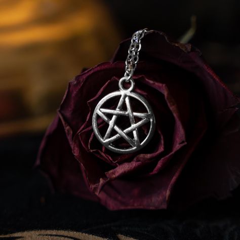 Embrace your mystical side with this stunning stainless steel silver pentacle necklace. Perfect for witches, Wiccans and lovers of the occult, this delicate yet powerful pentagram pendant symbolizes protection, balance, and spiritual connection.  🔮 Details: ✨ Made from stainless steel and hypoallergenic metals.  ✨ Pendant Size: Height 0.31in x Width 2.95in x Length 3.74in ✨ Chain Length: 18 to 24 inches ✨ Lightweight and comfortable for everyday wear  This witchy necklace makes an ideal gift for witches, Wiccans, Pagans, and spiritual seekers. Whether you're celebrating Samhain, a handfasting, or simply embracing your magical path, this pentacle charm is a timeless amulet of protection and empowerment.  🖤 Perfect for: 🖤 Witchcraft practitioners 🖤 Gothic and alternative fashion lovers Pagan Protection, Pentacle Necklace, Witchy Necklace, Pentagram Pendant, Wiccan Jewelry, Protection Amulet, The Occult, Spiritual Connection, Spiritual Gifts