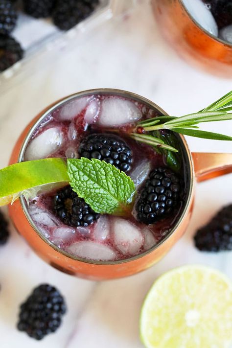 There's nothing better than an ice-cold Moscow Mule. Who's with me? Learn how to make our Blackberry Moscow Mule recipe in less than 5 minutes. Plus, we're sharing which Moscow Mule cups are the best. Blackberry Moscow Mule, Moscow Mule Recipe Classic, Best Moscow Mule, Moscow Mule Cups, Greyhound Cocktail, Spicy Drinks, Moscow Mule Recipe, Mule Recipe, Copper Moscow Mule Mugs