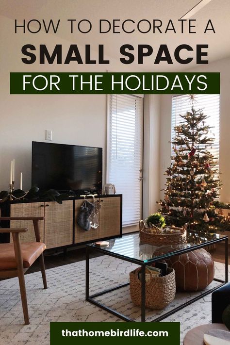 This year we are living in a small apartment so I had to get creative with our Christmas decor to make it cozy without the clutter. Find out how I achieved the look! | That Homebird Life Blog | #christmas #christmasdecor #holidaydecor Christmas Decor Ideas For Small Condo, Tiny Living Room Christmas Decor, Christmas Decoration For Small Apartment, Christmas Decor Ideas For A Small Apartment, Christmas Small Living Room, Christmas Condo Decor, Christmas In A Small House, Minimalist Christmas Decor Small Spaces, Simple Christmas Decor Small Apartment