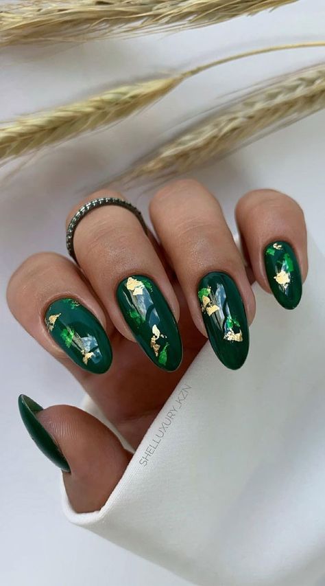 24. Deep Green Oval Shape Nails with Gold Foil Have you noticed the leaves are changing, so are our manicures — For those who... Green And Foil Nails, Emerald Green Nails Gold Foil, Deep Nails Designs, Wedding Nails Emerald Green, Dark Green Nails With Gold Flakes, Green And Gold Foil Nails, Dark Green Gold Nails, Green Foil Nails, Deep Green Nails Designs