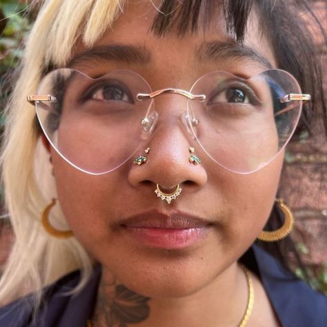 Allie Sweeney on Instagram: "Installed the Lala by @buddhajewelryofficial in my best friends septum today. She has my favorite set up by far. Check out her work @cambodiancupcake 💕" Gold Stackable Septum Ring, Gold Septum And Nostril Piercing, Handmade Gold Bohemian Septum Ring, Unique Septum Jewelry Gold, Septum Gold, Tarnish-resistant Yellow Gold Septum Ring, Septum Piercing, Piercings, Best Friends