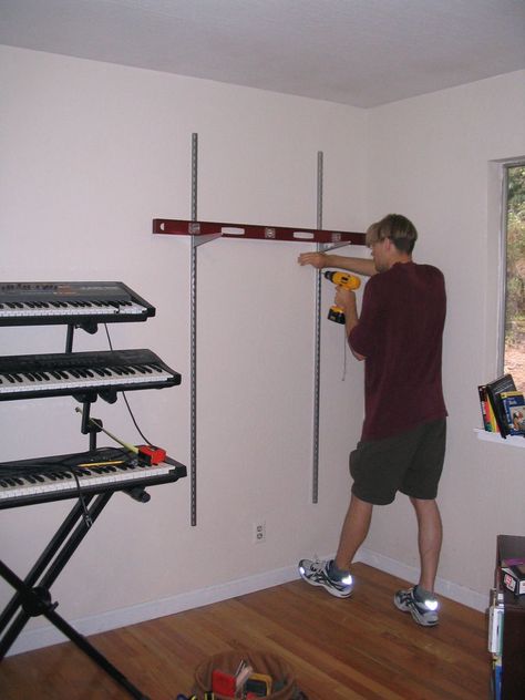 Do you have more books than shelf space? Give yourself some extra storage space by installing standard-and-bracket shelves. Installing these types of shelves is... Bracket Patterns, Bracket Shelving, Track Shelving, Bracket Shelves, Small Structures, Office Organizing, Bracket Shelf, Metal Shelf Brackets, Pantry Shelving