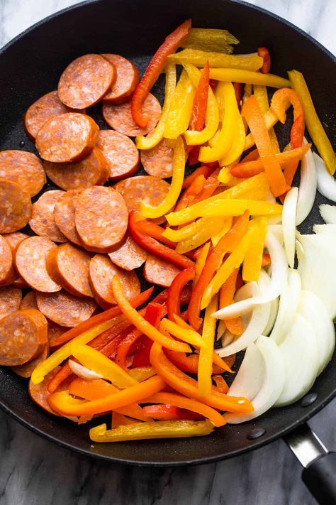 Featuring savory smoked sausage slices, colorful veggies, and a rich medley of herbs and spices, this Smoked Sausage and Peppers Skillet is the ultimate quick dinner everyone will love! Smoked Sausage And Peppers, Sausage And Peppers Skillet, Sausage And Peppers Recipe, 15 Min Meals, Italian Sausage And Peppers, Quick Dinner Options, Sausage Recipes For Dinner, Smoked Sausage Recipes, Colorful Veggies