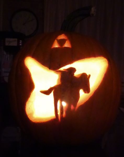 Legend of Zelda, Ocarina of Time Carved Pumpkin Link riding Epona with the Ocarina and Triforce lit up in the background. Acnh Pumpkin Carving Ideas, Legend Of Zelda Pumpkin Carving, Pumpkin Carving Animal Crossing, Acnh Pumpkin Carving, Korok Zelda Pumpkin Carving, Zelda Pumpkin Carving, Zelda Pumpkin, Castle Decorations, Halloween Castle