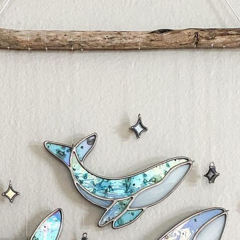 Nordquist & Co Glassworks on Instagram: "The Luna Whale collection has finally returned! 🐋✨ This limited edition collaboration between myself and Isa (@heart_of_stained_glass) was an idea we developed together about a year ago, and we are so excited to bring it back, with the addition of a pink moon colorway! 🤗 Isa creates the beautiful moon-like glass by hand painting rare, discontinued iridescent Spectrum glass, for an effect unlike any other. She sends the moon glass to me, and I turn them into these final pieces, complete with dichroic stars and Columbia River driftwood, harvested at my family’s cabin in the Gorge. There is something so special about the bond between a mother and child, and to me this celestial collection invokes that almost ethereal feeling one gets when witnessin Stained Glass Whale, Moon Glass, Spectrum Glass, Stained Glass Studio, Cottage Witch, The Gorge, Collage Art Projects, Surf Shack, Bring It Back