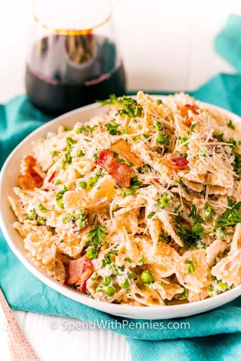 Farfalle pasta with bacon is a savory pasta dish made with lots of cheese sauce and garlic, Italian style! It comes together quick and easy on the stovetop. #spendwithpennies #farfallepasta #bowtiepasta #entree #recipe #bacon #parmesan #cheesesauce #pastadish #italian #easy Farfalle Pasta Recipes, Farfalle Recipes, Pasta With Bacon, Bacon Sauce, Fettuccine Alfredo Recipes, Farfalle Pasta, Cream Sauce Recipes, Spend With Pennies, Bacon Pasta