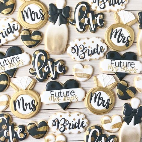 Black and gold bridal shower cookies! Sometimes the simplest color schemes are the prettiest. . . . . #cookies #customcookies… Black White Gold Wedding Cookies, Black And Cream Bridal Shower Ideas, Black Wedding Cookies, Black And Gold Bridal Shower Ideas, Bridal Shower Cookies Ideas, Shower Food Display, Prettiest Cookies, Bridal Shower Food Display, Wedding Color Schemes Gold