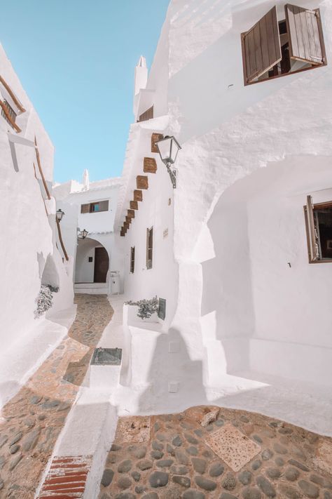 Perched on the south coast of Menorca, Binibeca is a totally stunning and historic fishing village that’s well worth exploring. Menorca Spain Aesthetic, Menorca Beaches, Menorca Spain, Places In Spain, Balearic Islands, Architect House, Hand Luggage, Home Inspiration, Menorca