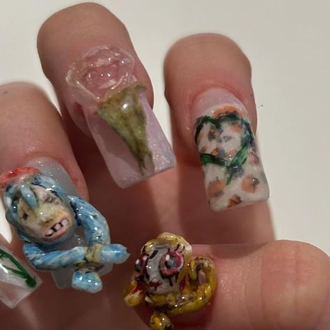 elliot on Instagram: "slight duck nail w clay charms + twinkle toe inspired rose and monchichi thumb :3 literally just put top coat on the center of a dried rose i found n cut it out so ty flower for being chill  _  _  _  #monchichi #nailart #acrylics #sculpture #horror #gyaru" Slight Duck Nails, Duck Nail, Duck Nails, Cut It Out, Clay Charms, Cut It, Top Coat, Twinkle Twinkle, Nails Inspiration