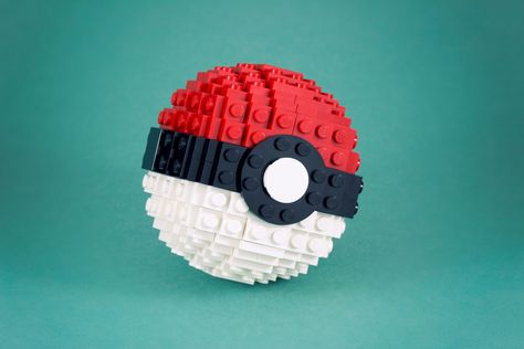 DIY Pokeball: Hide Your Treasures Inside -- Great Birthday Invitation or Gift Box! | JenuineMom.com Lego Pokemon, Brick Lego, Lego Theme, Lego Videos, Pokemon Diy, Pokemon Ball, Lego Sculptures, Amazing Lego Creations, Lego Room