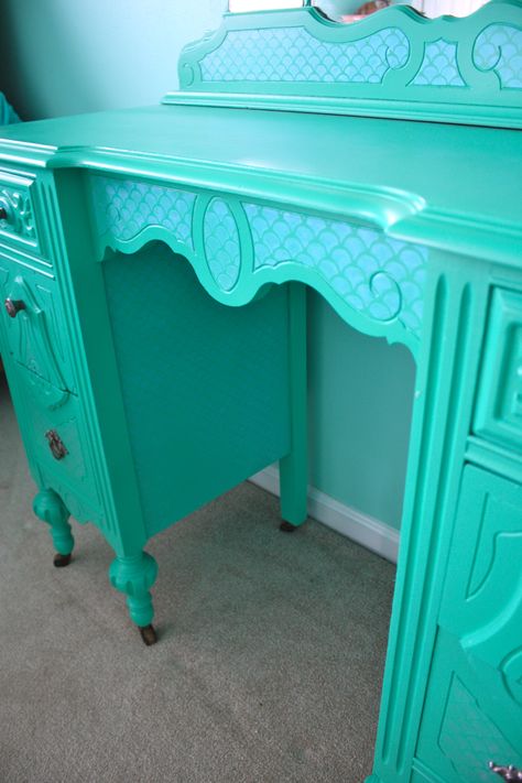 Vintage Vanity  Painted with Behr paint "Mermaid Song" Modern Masters Flash Blue Sheer Paint & Teresa Collins Scallop Stencil to create Mermaid inspired scales for the drawer faces, sides, and mirror. Mermaid Vanity Ideas, Mermaid Desk, Mermaid Vanity, Mermaid Painted Furniture, Mermaid Dresser, Mermaid Dresser Painted, Sea Theme Bedrooms, Mermaid Painted Dressers, Mermaid Drawer Pulls