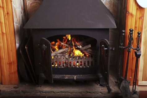 How to Clean a Cast Iron Wood Stove | Hunker Cast Iron Wood Stove, Franklin Stove, Home Cleaning Remedies, Small Wood Stove, Calcium Deposits, Fireplace Andirons, Cast Iron Cleaning, Brick Fireplace Makeover, Wood Heater