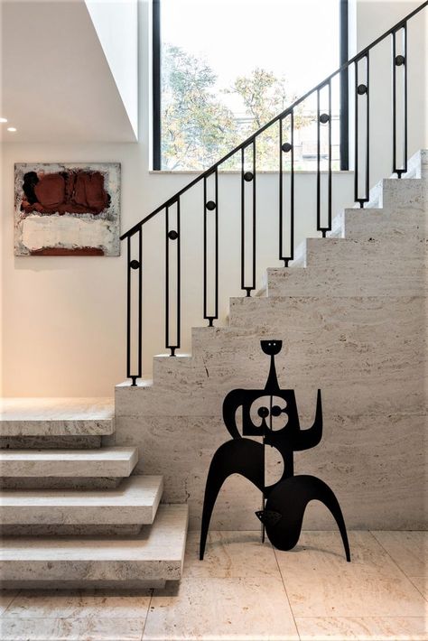 SVAREF High-end interior design inspiration reference image of an abstract black steel Calder like sculpture in a modern hallway Inspiration Reference, Black Sculpture, Interior Stair Railing, Staircase Interior Design, Staircase Wall Decor, Mediterranean Interior Design, Staircase Runner, Staircase Railing Design, Handrail Design