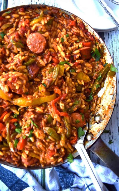 Cheesy Orzo: One Pan Orzo With Sausage And Peppers Healthy Orzo Recipes, Orzo With Sausage, One Pan Orzo, Healthy Orzo, Cheesy Orzo, How To Cook Orzo, Dinner Leftovers, Hearty Dinner Recipes, Orzo Recipes