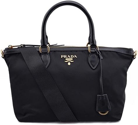 Leather,Nylon Imported A Prada classic, this tessuto nylon two-way bag is perfect for everyday wear. The large open interior can fit all of your necessities, and has a zip top closure. There is one zip pocket, and one magnetic slip pocket on the interior. On the exterior, the Prada logo is in gold hardware. Double rolled smooth leather top handle, and includes removable nylon strap. Wear as a shoulder bag, or carry as a tote. This bag is lightweight, and would be a great bag for travel. Model: 1 Bag For Travel, Prada Logo, Satchel Handbag, Satchel Handbags, Zip Top, Leather Top, Smooth Leather, Gold Hardware, Luxury Bags