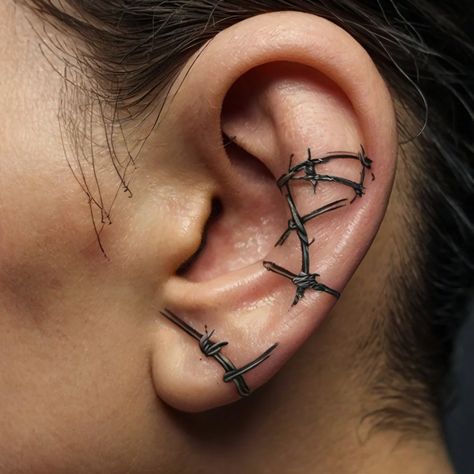 Discover the meaning, symbolism, and significance of barbed wire tattoos with our guide featuring 46 unique designs. Barbed wire tattoos often represent strength, resilience, and protection, while also symbolizing life’s struggles or personal boundaries. Explore various styles and interpretations, from minimalist designs to intricate patterns, and find inspiration for your next ink. Perfect for anyone looking to express a deeper personal story through body art. #TattooInspiration #BarbedWireTatt December Tattoo, Barbed Wire Tattoo, Wire Tattoo, Barbed Wire Tattoos, Barbed Wire Art, Tattoo Appointment, Tattoos Meaning, Personal Boundaries, Barbed Wire