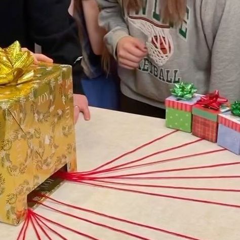 Benson Bros on Instagram: "Christmas Present String Pull Game! 🎁 #games #familygames #christmas #familygamenight #christmasparty #reels #partygames #tablegames" Present String Pull Game, Pull The String Christmas Game, String Pull Game, Pull A String Challenge Game, Benson Brothers Christmas Games, Benson Bros Games, Christmas Present Games, Benson Bros, Christmas Gift Games