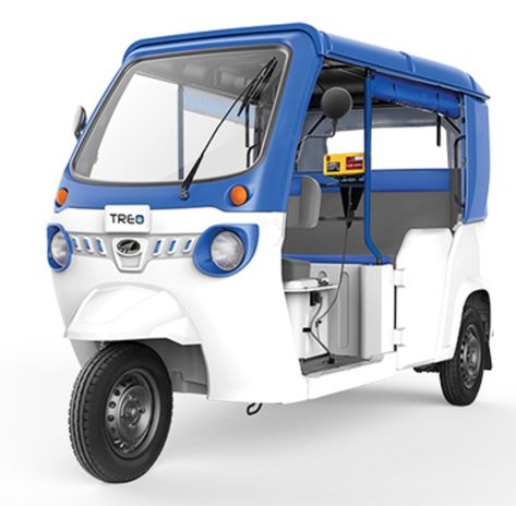 A view from the front of the Mahindra Treo electric rickshaw in the color of blue and white. Sustainable Transportation, Auto Rickshaw, Last Mile, Wednesday Motivation, Electric Motor, Bike Life, Innovation Technology, Low Maintenance, High Performance