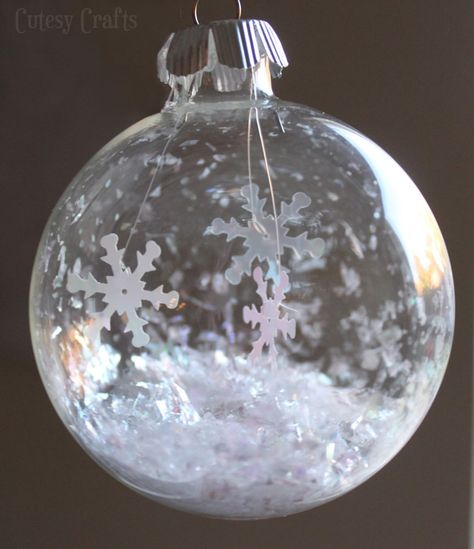 I couldn’t do a 12 Days of Handmade Christmas Ornaments series without making a glass ball ornament, so for day ten I filled one with some pretty fake snow and snowflakes.  I love the way the snowflakes reflect the light! I used the same glittery fake snow that I used for my snow globe ornament.  … Glass Ornaments Diy, Clear Christmas Ornaments, Clear Glass Ornaments, Diy Christmas Ornament, Diy Christmas Tree Ornaments, Clear Ornaments, Globe Ornament, Glass Ball Ornaments, Christmas Ornaments Homemade