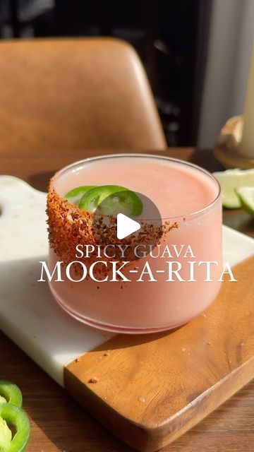 134K views · 13K likes | Nikki Sips 🤘🏻🍸 on Instagram: "Made this for the hundreds of sweet souls who asked for a mocktail version of my viral spicy guava margarita from last month.  She’s spicy, sweet, and frozen— you almost forget the alcohol is missing.  Happy Mocktail Monday my friends! 🫶🏼☺️☀️

____

Spicy Guava Mock-a-Rita

You’ll Need:
2 oz guava syrup (linked in Amazon storefront)
2 oz jalapeño infused pineapple juice (easy recipe below)
1 oz cream of coconut 
1 lime, juiced
Scoop of ice
Tajin (I am who I am)
Agave
2 jalapeño slices 

Prepare your glass by painting with agave and dipping into tajin.  In a blender, combine guava, lime juice, pineapple, cream of coconut, and ice.  Blend until smooth.  Pour into prepped glass and garnish with two jalapeño slices. ☀️🌶️

____

Jalap Spicy Guava Margarita, Spicy Mocktail Recipe, Guava Mocktail, Homemade Spirits, Guava Syrup, Guava Drink, Guava Margarita, Cream Of Coconut, Who Asked