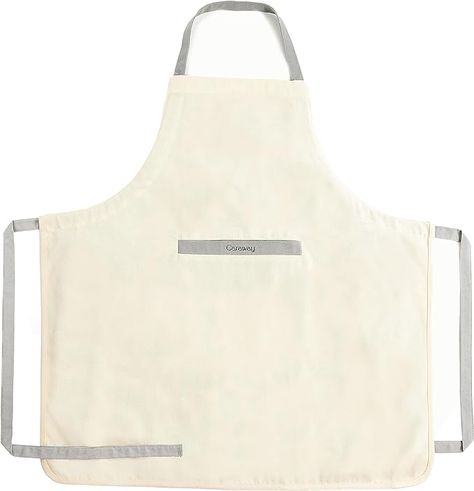 Amazon.com: Caraway Apron - 100% Organic Cotton Apron - Features 2 Pockets & Adjustable Neck Strap - Absorbs Liquids & Dissipates Heat With Ease - Machine Washable - One Size - Cream : Home & Kitchen Branded Aprons, Neck Cream, Bib Apron, Cotton Apron, Apron Pockets, Organic Cotton Fabric, Kitchen Aprons, Kitchen Linens, Linen Apron