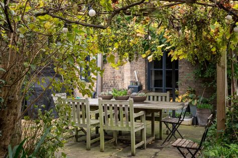 For Sale: Wisteria House, Blunham, Bedfordshire | The Modern House Garden Wisteria, Wisteria House, Countryside Living, Stone Chimney, Terracotta Floor, Modern Renovation, Wooden Floorboards, Timber Beams, Chimney Breast