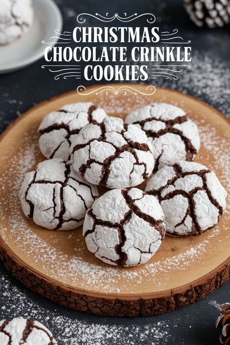 Christmas chocolate crinkle cookies on a wooden plate, dusted with powdered sugar. Kringle Cookies Chocolate, Christmas Rock Cookies, Soft Chocolate Crinkle Cookies, Mocha Crinkle Cookies, Hot Chocolate Crinkle Cookies, Preppy Kitchen Crinkle Cookies, Christmas Chocolate Crinkle Cookies, Chocolate Peppermint Crackle Cookies, Double Chocolate Crinkle Cookies Recipe