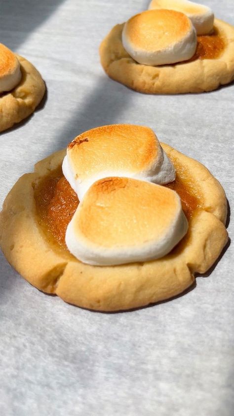 761K views · 1K reactions | Warm up your day with one of these sweet potato pie cookies, made with a thumbprint cookie base and filled with sweet potato pie, then topped with toasted marshmallows. Can you say YUM? @karinabakeswithlove Here’s your shopping list: Unsalted Butter Granulated Sugar All Purpose Flour Sweet Potatoes Eggs Brown Sugar Milk Cornstarch Cinnamon Ginger Nutmeg Vanilla Extract Marshmallows Head to karinabakeswithlove.com for the full recipe. | Tasty Sweet Potato Toast Recipes, Sweet Potato Pie Cookies, Easy Thanksgiving Cookies, Sweet Potato Pie Filling, Classic Holiday Desserts, Brown Sugar Milk, Vegan Sweet Potato Pie, Christmas Side Dish Recipes, Sweet Potato Cookies