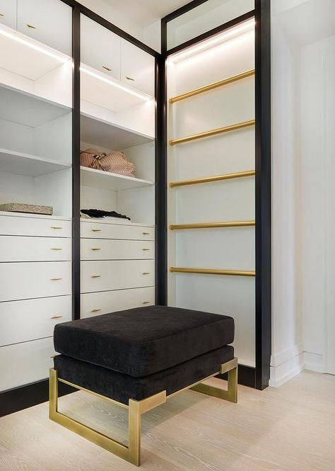 Izen Architecture - A black velvet stool finished with brass legs sits to the side of lighted stacked gold scarf rails mounted adjacent to white built-in dressers adorned with brass pulls and fixed beneath custom lit shelves and flat front cabinets. White Closet Ideas, Black And White Closet, Slanted Shoe Shelves, Bedroom Ideas Black, Gorgeous Closet, House Closet, Contemporary Closet, Closet Island, Black Closet