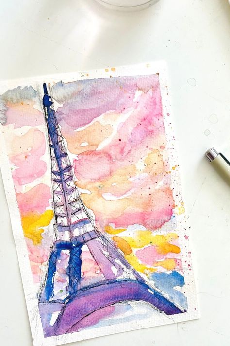 The Eiffel Tower is still one of my favorite things to paint, sketch & doodle! Paint with me (plus lots of other ideas for Paris-inspired watercolors)! #paintparis #eiffeltower #watercolorparis #watercolorworkshop #watercoloreiffeltower #Pariswatercolor #easywatercolor #eiffeltowersketch Eiffel Tower Watercolor, Watercolor Painting Easy, Things To Paint, Eiffel Tower Art, Paris Tower, Paint With Me, Doodle Paint, Watercolor Workshop, Paris Inspired