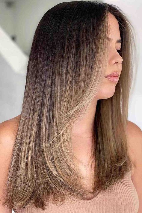 A medium-length straight cut with ombre creates a subtle yet powerful impact on your overall look. It creates a beautiful blend between the layers and the length. Tap on the link to see more gorgeous straight-layered hair ideas. // Photo Credit: @studiomdh on Instagram Medium To Long Length Haircut Straight, Layered Hairstyles Straight Hair, Light Brown Balayage Straight, Dark Brown To Light Brown Balayage, Light Brown Ombre, Balayage Haircut, Hairstyles Straight Hair, Balayage Long Hair, Brown Straight Hair