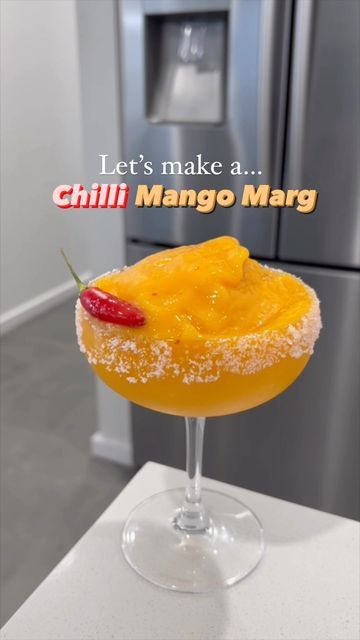 diycocktailguy on Instagram: "Let’s make a Chilli Mango Margarita. I couldn’t believe how delicious this was. Definitely has a bit of a kick but complements the mango so well 😍 Recipe/ingredients In your blender add: 1 cup of Frozen Mango 1/2 a chilli chopped finely (I took out the seeds which I think was a good move) 45mls or 1.5oz Tequila 30mls or 1oz Cointreau 30mls or 1oz Lime Juice 60mls or 2oz Tropical Juice Blend all together and serve in your Margarita glass. I garnished the glass Tropical Juice, Frozen Mango, Mango Margarita, Wellness Recipes, Recipe Ingredients, Lime Juice, 2 A, 1 Cup, Ingredients Recipes