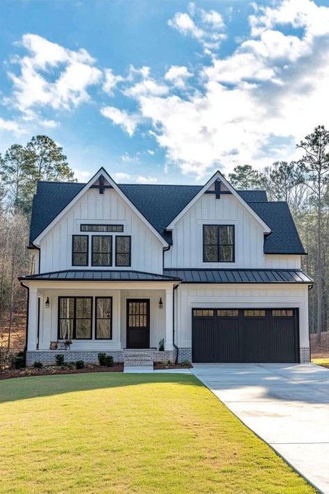 White, two-story house with black accents and lush lawn. Ever find yourself daydreaming about the perfect house while scrolling through listings way out of your budget? You’re not alone. Front Porch Modern Farmhouse, Exterior Home Color Schemes, Exterior Home Makeover, Farmhouse Build, Farmhouse Exteriors, White Modern Farmhouse, Building Plans House, House Color Schemes, Modern Farmhouse Exterior