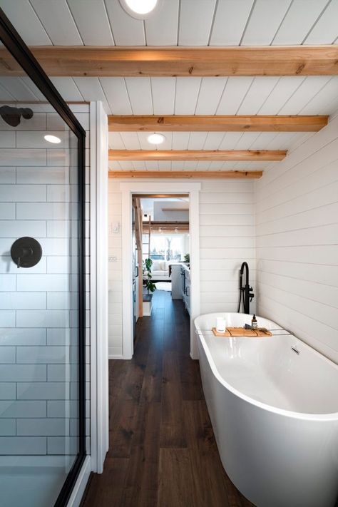 Light-filled tiny house offers a relaxing soak Bohemian Tiny House, Skoolie Conversion, Tiny House Company, Tiny House Bedroom, Kombi Home, Tiny House Interior Design, Tiny House Loft, Tiny House Inspiration, Tiled Shower