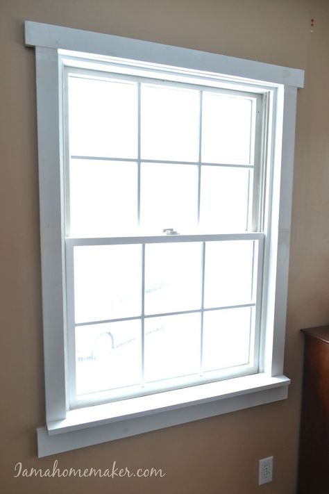 See how I turned my old, tired windows into a fun farmhouse style at http://www.iamahomemaker.com/farmhouse-window-trim/ Mdf Window Trim, Trimming Out Windows Interior, Add Trim To Windows, How To Frame Windows, Window Moulding Ideas, Modern Window Casing, Simple Window Trim, Farmhouse Window Trim, Geometry Project