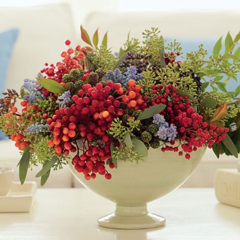 Colorful bouquet Show off a vibrant mix of berries, seeded eucalyptus, and flowers in a pedestal bowl.  When arranging, think triangles: Sta... Thanksgiving Floral Arrangements, Holiday Berries, Thanksgiving Floral, Winter Arrangements, Plantas Bonsai, Colorful Bouquet, White Vase, Beautiful Flower Arrangements, Winter Flowers