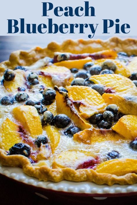 My grandmother's easy peach pie recipe is a family favorite and only takes a few minutes to assemble. This peach blueberry pie is loaded with fresh summer fruit nestled in simple custard. #peachpie #blueberryrecipes Peach And Blueberry Pie, Peach Blueberry Pie, Blueberry Treats, Easy Pies, Easy Peach Pie, Pie Store, Easy Custard, Blueberry Filling, Peach Pie Recipes