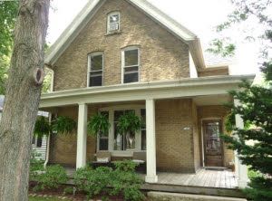 Find this home on Realtor.com Cream Brick House, Cream City Brick, Brick Farmhouse, Stone Homes, Faux Stone Siding, House Victorian, Brick Siding, Farmhouse Kitchen Remodel, Brick Exterior House