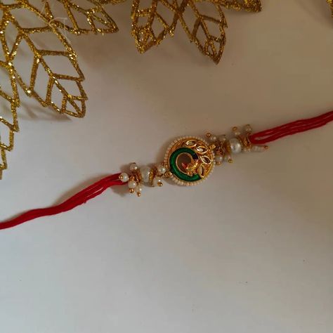 Peacock rakhi#beads color can be customised#dm for price n more information Peacock Rakhi, Beads, Canning, Color