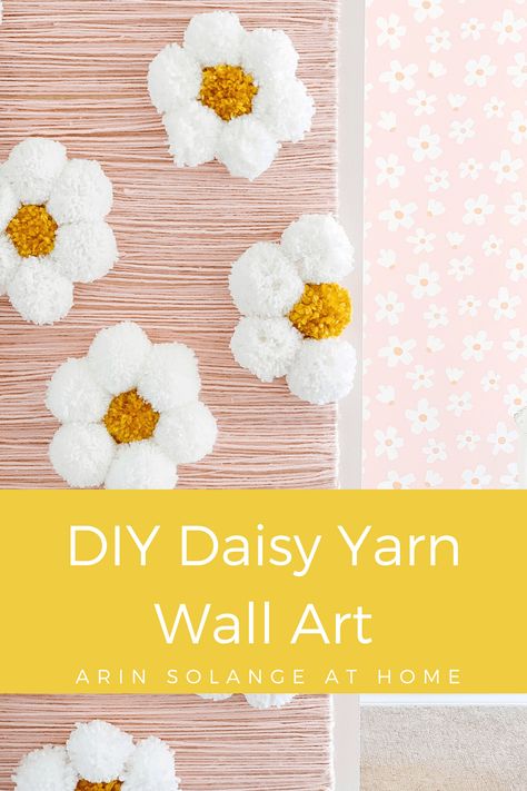 This DIY yarn wall art of Daisy pom poms is a great way to make a feature wall on a small budget.  Check out the DIY tutorial in this post - #diy #kidsroom #diyproject Yarn Daisy, Diy Daisy, Diy Flower Wall, Daisy Wall Art, Daisy Wall, Condo Decor, Yarn Wall Art, Yarn Wall, Diy Yarn