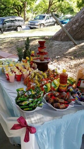 Chamoy Fountain Ideas, Chamoy Party Table, Chamoy Fruit Table, Hot Cheeto Bar Party, Chamoy Table For Party, Chamoy Candy Table Ideas, Chamoy Fountain Bar, Chamoy Fountain, Chamoy Bar