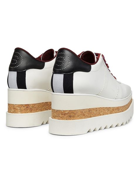 "Find STELLA MCCARTNEY Sneakelyse 80mm Platform Sneakers on Editorialist. Crafted in Spain, Stella McCartney's SneakElyse sneakers are set on a cork platform sole. This square-toe style features a striped heel counter detailed with a signature perforated logo. Square toe Lace-up style Textile upper Textile lining EVA sole Made in Spain SIZE Platform: about 3.25\" (80mm). Stella McCartney. Color: White. Size: 6." Heeled Rain Boots, High Heel Rain Boots, Lingerie Bag, Shoe Boot Sandals, Backpack Tote Bag, Boot Accessories, Eva Sole, Platform Sneakers, Boot Sandals