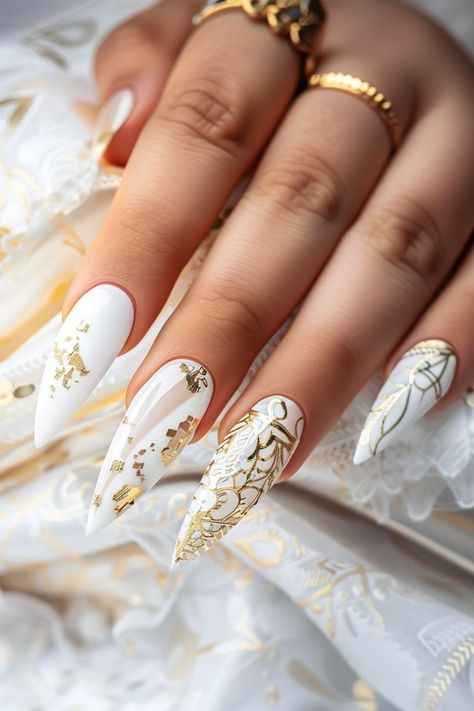 Step into elegance with these 38 white nail styles! Perfect for a clean, polished look, these nails feature everything from simple designs to elaborate art. Suitable for any event, these white nails will make your hands look effortlessly chic. Tap the link for more nail style inspiration! Long White Nails With Designs, White Nail Styles, Elaborate Nail Art, White Winter Nails, Gold Stiletto Nails, Lace Nail Design, Halloween Nail Art Easy, Black Halloween Nails, Spring Break Nails