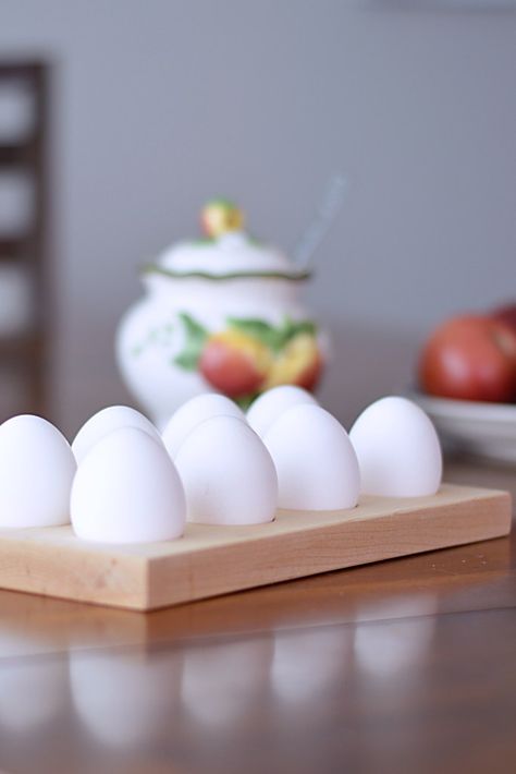 Display your farm fresh eggs or brightly colored Easter eggs with this DIY wooden egg holder! This makes a great gift idea. It is useful, practical, and looks pretty on a brunch table. #eggholder #easteregg #woodeneggholder #eastergift Wooden Egg Holder, Colored Easter Eggs, Storing Eggs, Spring Gift Ideas, Little Farmhouse, Spring Porch Decor, Brunch Table, Spring Crafts For Kids, Easter Egg Painting