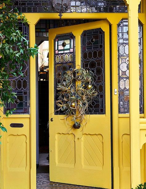 “Be brave and go for bright yellow for a warm, inviting entrance. It’s the first thing your guests will see, so why not make it bold and expressive!” This front door and frame were painted with Chalk Paint® in Tilton and finished with Chalk Paint Lacquer. | Source: Annie Sloan Orange Front Doors, Hallway Paint, Yellow Front Doors, Oval Room Blue, Green Front Doors, Door Colors, Yellow Doors, Red Brick House, Weekend House