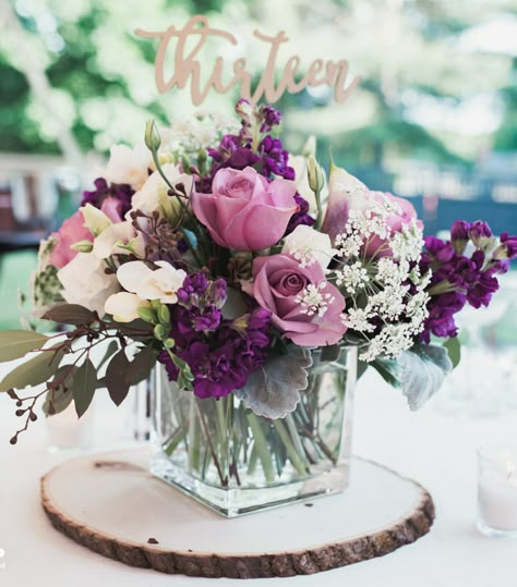 Square Floral Arrangements, White And Purple Centerpieces Wedding, Lilac Flower Centerpieces, Purple Floral Wedding Centerpieces, Purple Flowers Centerpieces, Simple Purple Centerpieces, Purple And White Centerpieces, Purple Floral Centerpiece, Square Centerpieces